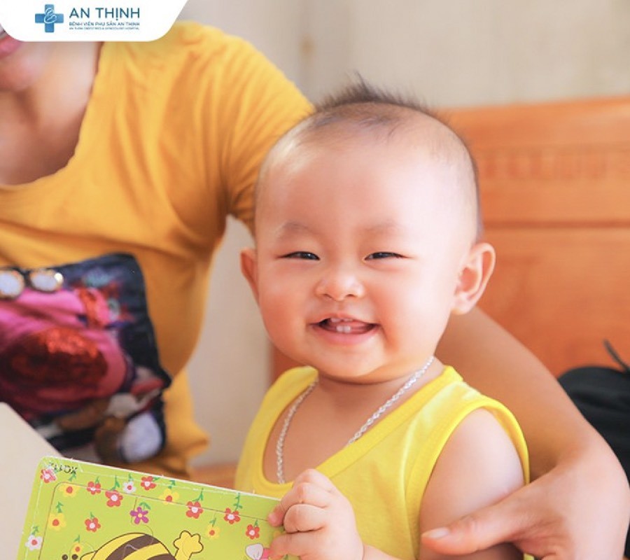 Nụ cười con trẻ là món quà vô giá đối với gia đình chị Cao Thị Lý Phượng trong xuân này.